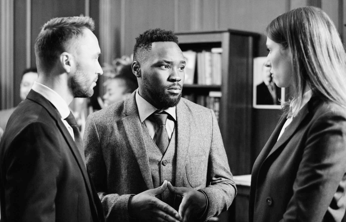 3 Persons Having A Business Meeting - Black and White